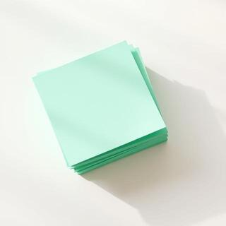 Stack of mint sticky notes