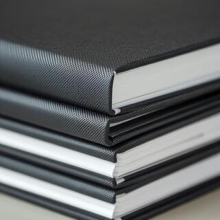Charcoal notebook spine, stitched