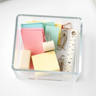 Sticky tabs in a small desk organizer